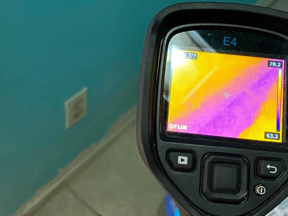 Thermal camera scanning wall for hidden moisture